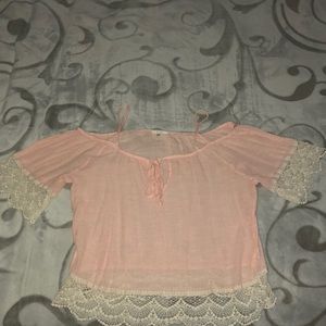 A light pink over the shoulder top